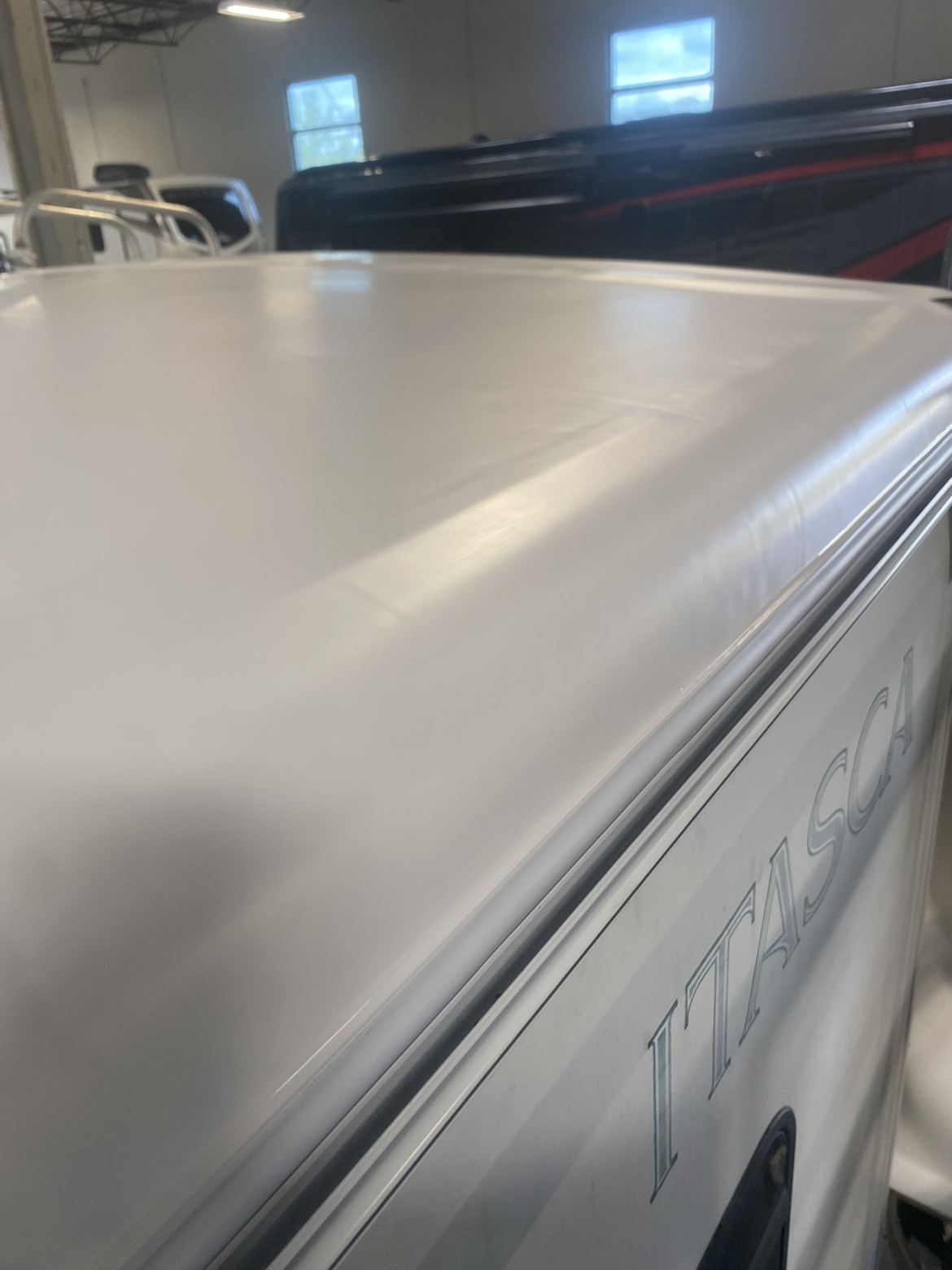 RV roof after repair, finished edge detail